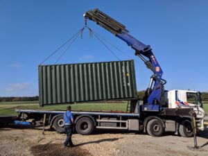 hiab, container sales, grass, drive over grass, drive over mud, container delivery,