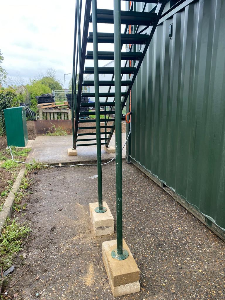 Staircase on hospital site office and canteen converted shipping containers