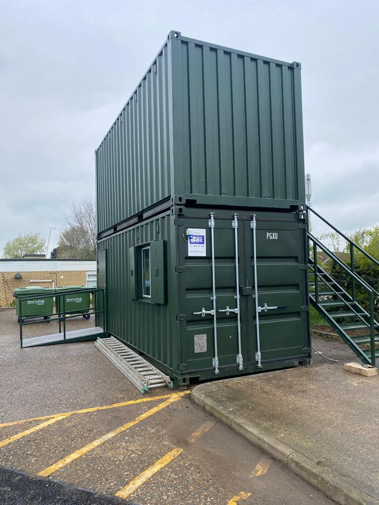 End view of hospital site office and canteen converted shipping containers