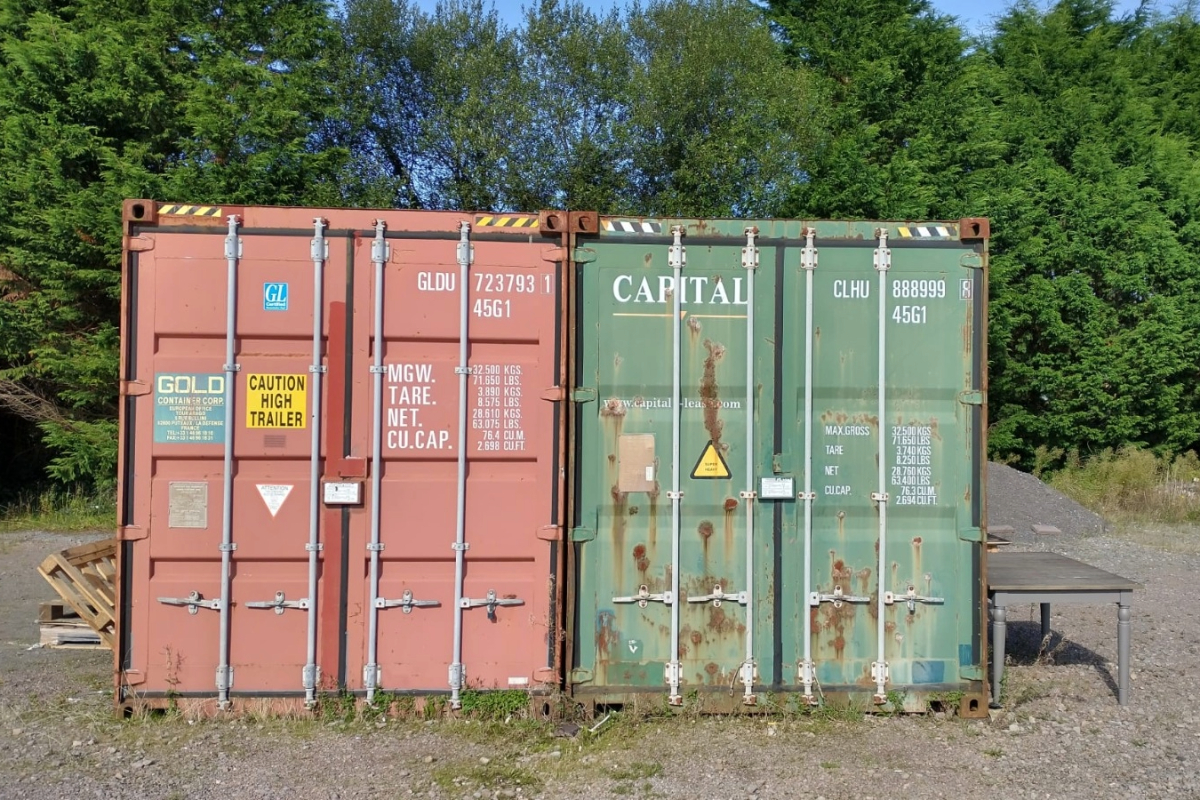 Hired storage containers at a busy garden centre.